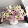 A tender expression of care, this soft-toned arrangement is designed to soothe
