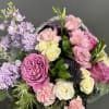 Misty Basket creates an enchanting scene with a delicate mix of white