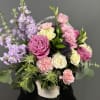 Misty Basket creates an enchanting scene with a delicate mix of white