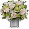 As breathtaking as sunlight sparkling on a lake, this peaceful bouquet of