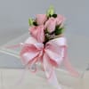 Orchid or rose boutonniere include seasonal greens, and a ribbon in the