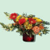 A whimsical design inspired by the curling of the faux gourds nestled