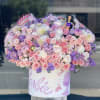 Extravagant arrangement with premium flowers in a velvet box. Barbie themed. Kimora