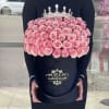 Pink fresh roses in our signature velvet black box with a shiny