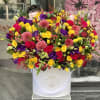 Happy Colors 
all seasonal flowers will be substituted