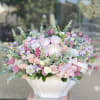 Pastel colors and premium flowers in a lotus vase
