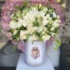 White Roses with greenery in a velvet box