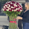 375 red and white roses standing bouquet. Doesn&rsquo;t require a vase. 