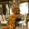 The whole set includes one big centerpiece, cascading centerpiece, small glass vases