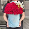 Standard 50 red roses in a turquoise signature box with a small