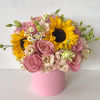 Contains golden sunflowers surrounded by an array of complementary blooms in warm