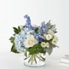 Let this uplifting arrangement be reminders of the clear skies ahead. Capturing