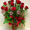 Express your affection with a classic symbol of love. One dozen long
