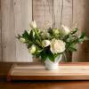  Simple yet elegant footed vase with seasonal flowers. colors and flowers