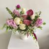  Simple yet elegant footed vase with seasonal flowers. colors and flowers