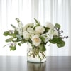Artistically crafted all white bouquet that is sure to stun your loved