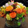 A beautiful mixture of fresh flowers in shades of yellows, orange, and