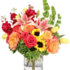 BRIGHT SEASONAL FLOWERS IN  A VASE
