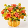 This fun fall festive floral mix arrives in a keepsake orange ceramic