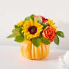 A bouquet made up of fall tones in this gold dipped cylinder