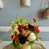 Whites and oranges with hints of burgundy and yellow will take you