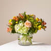 This radiant bouquet is designed with a dreamy mix of peach, yellow