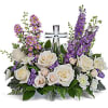 Soft and serene, this artistic array of cream and lavender blooms around