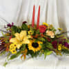 Classic and beautiful, this centerpiece will be lovely gracing your Thanksgiving table