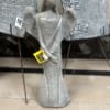 A stone angel standing about 18.5 inches tall.