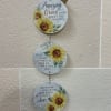 A thermal printed spinner with sunflowers printed on it.

Text Reads: &quot;Amazing Grace