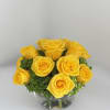 A compact arrangement of yellow garden roses and green hydrangeas with vibrant