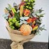 This bouquet consists of a variety of colors and flowers that are