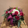 A romantic, fresh and springy arrangement. Classic Valentines colors, low and full