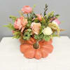 Celebrate the warmth of autumn with our Pumpkin Petals Delight arrangement. Nestled