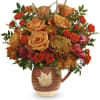 Capture the beauty of cascading fall leaves with this heartwarming rose bouquet