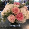 Lavish cube designed with mixed pink roses, white hydrangeas, white lisianthus 