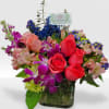 Mixed flowers for a garden looking arrangement.