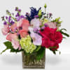 Mixed flowers for a garden looking arrangement.