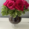 &quot;Rosy Delight&quot; centerpiece, an exquisite floral arrangement designed to captivate and charm.