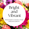 Trust us to create a unique bright and vibrant vase arrangement. We