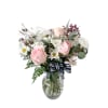a soft mix of roses, daisies, and eucalyptus 