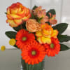 This bouquet is a celebration of the lively hues found in citrus