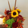 Beautiful, fresh flowers designed in this ceramic pumpkin....the Perfect Autumn gift!!