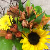 The colors and textures of fall inspire this robust arrangement, with a