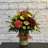 Send this lovely arrangement with a candle to keep and enjoy!