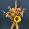 Celebrate the Fall Season with this colorful and vibrant arrangement. This mason