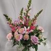  An elegant flower arrangement with a beautiful assortment of Stargazer Lillie&#039;s