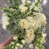 Experience the versatility of our Timeless Elegance Bridal Bouquet, expertly crafted for