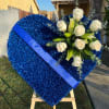 Closed blue heart with custom ribbon. Comes with easel. 