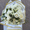 Classic and serene, Ivory Grace is a luxurious bouquet of white roses